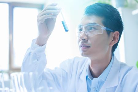 man using a testing tube